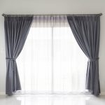 Best Ways to Style Custom Linen Curtains, Blackout Drapes, and Bedroom Roman Shades Together